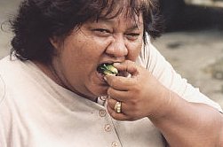 Pic of woman chewing the Betel Nut