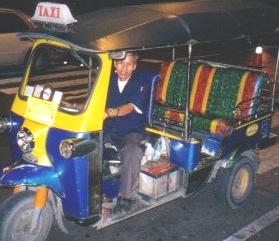 Three wheeled taxi, which got it's name from the sound the engine makes.